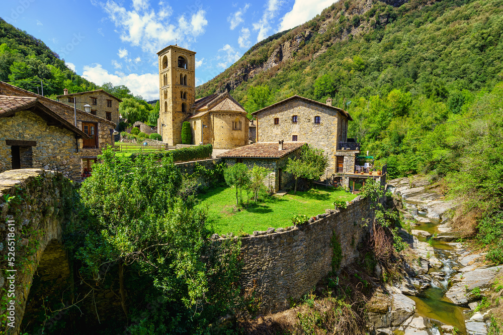 Spectacular mountain village with old houses made of stone and Romanesque church with bell tower, Beget, Girona, Catalonia.