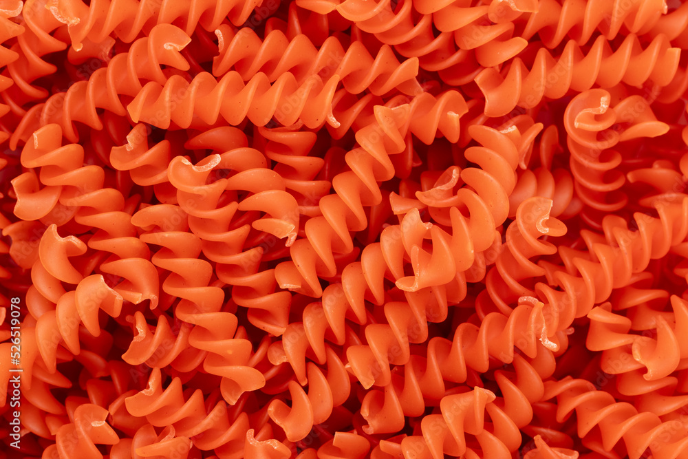 Fototapeta premium Whole, lentils fusilli pasta background.