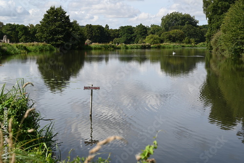 No fishing sign at a lake at an English country estate in Surrey. #526520689