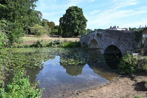 A Medieval stone bridge at a Country Estate in Surrey.  #526520692