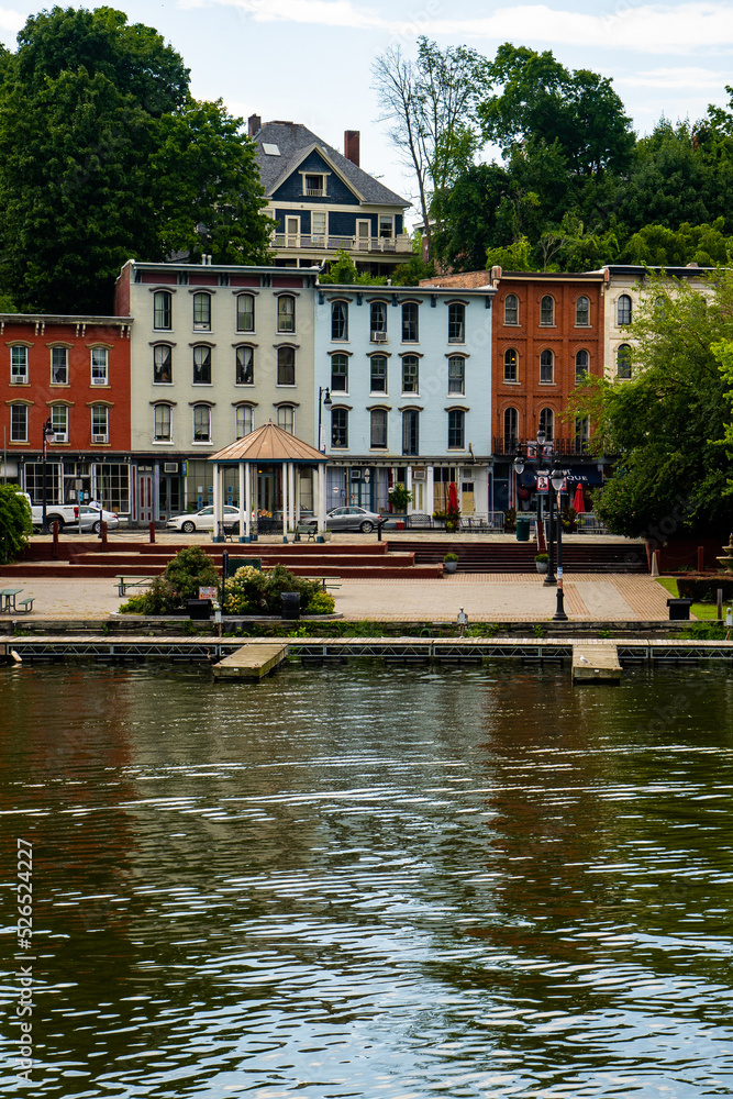Kingston, NY – USA – Aug 2, 2022 Vertical view of the shops, restaurants and small businesses that line West Strand Street in the historic Rondout district in Kingston NY.