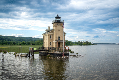 Kingston, NY – USA – Aug 2, 2022 Horizontal view of the historic Rondout Light, a lighthouse consisting of a square tower and attached to a rectangular, two-story dwelling. Built on the Hudson River.