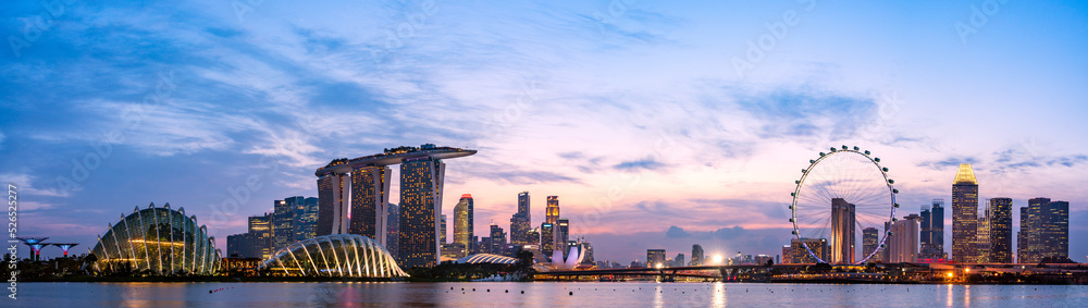 Panoramic view of Singapore skyline at magic hour.