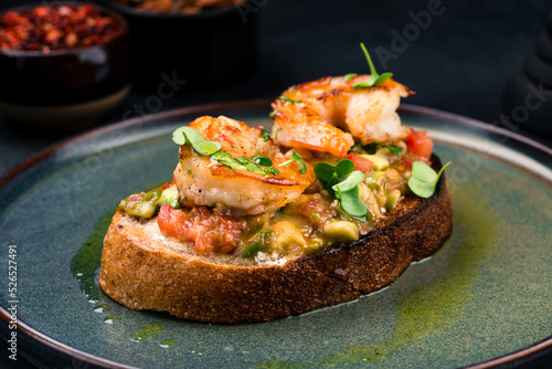 Bruschetta with shrimps and micro greens. Healthy eating concept