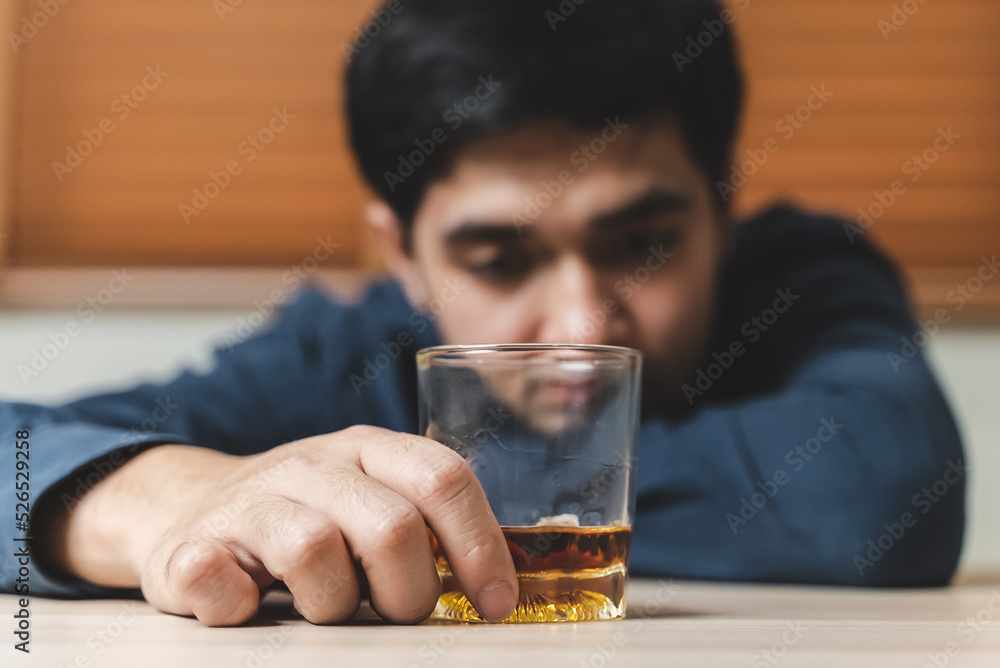 drunk man fall asleep on the table with whiskey glass drunk man fall asleep on the table with whiskey glass