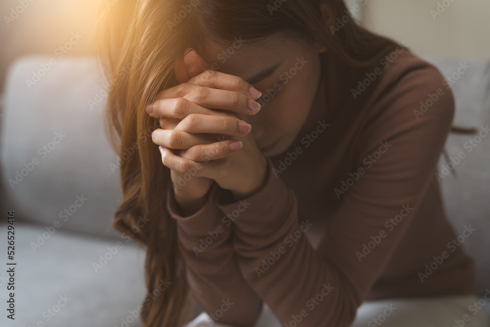 Christian woman praying for god blessing. - obrazy, fototapety, plakaty 