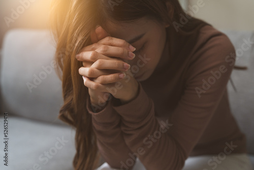 Christian woman praying for god blessing.