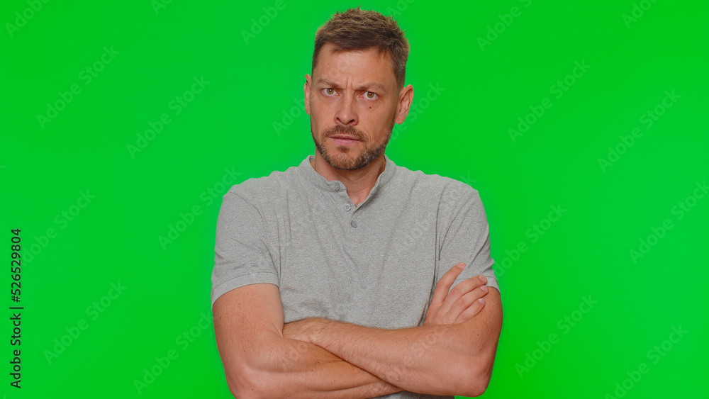 Dissatisfied handsome young man asking reason of failure, expressing disbelief irritation, feeling bored, disappointed in result, bad news. Adult guy isolated alone on chroma key studio background Dissatisfied handsome young man asking reason of failure, expressing disbelief irritation, feeling bored, disappointed in result, bad news. Adult guy isolated alone on chroma key studio background