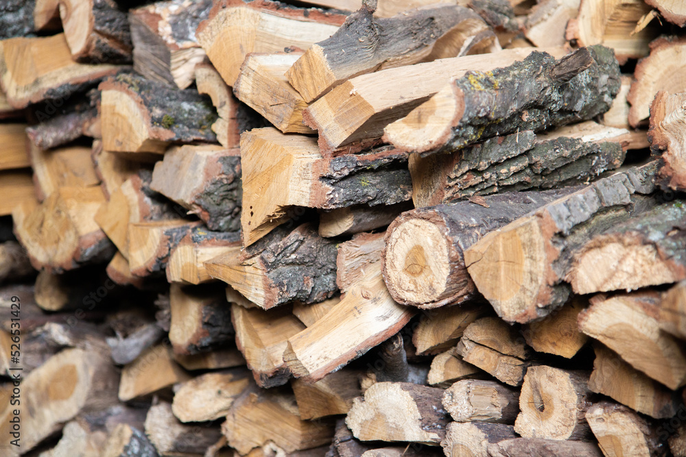 many logs stacked in rows, logging many logs stacked in rows, logging
