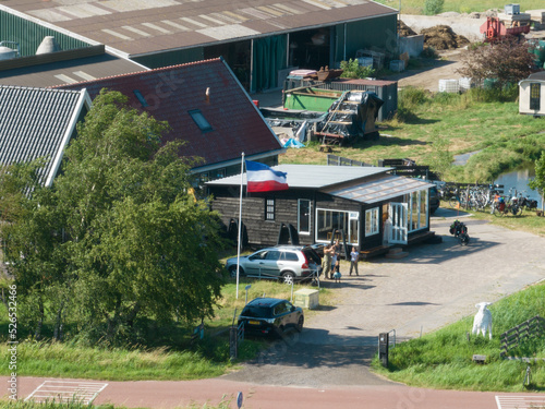 Farmers protest in The Netherlands, dutch flag upside down. Protest actions by dutch farmers. government wants to limit livestock farming to solve the nitrogen environmental crisis. Demonstrations photo