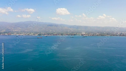 Aerial drone of Zamboanga city with its seaport and ships. Commercial and industrial center of the Zamboanga Peninsula Region. Mindanao, Philippines. photo