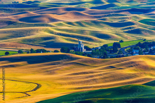 grain elevator and town of Steptoe in eastern Washington seen from Steptoe Butte State Park. This is a vast region of mostly wheat farmland. photo
