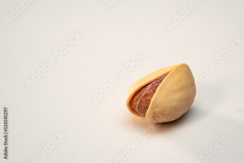 one pistachio on a white isolated background