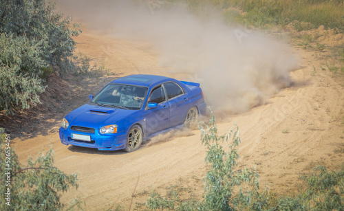 Sports Car on the Turn of the Rally Track and a Lot of Dust 07