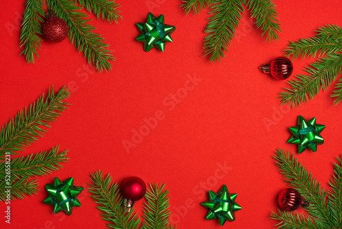 Set of festive  fir tree and Christmas decorations on colourful background. Top view of New Year ornament concept with copy space.
