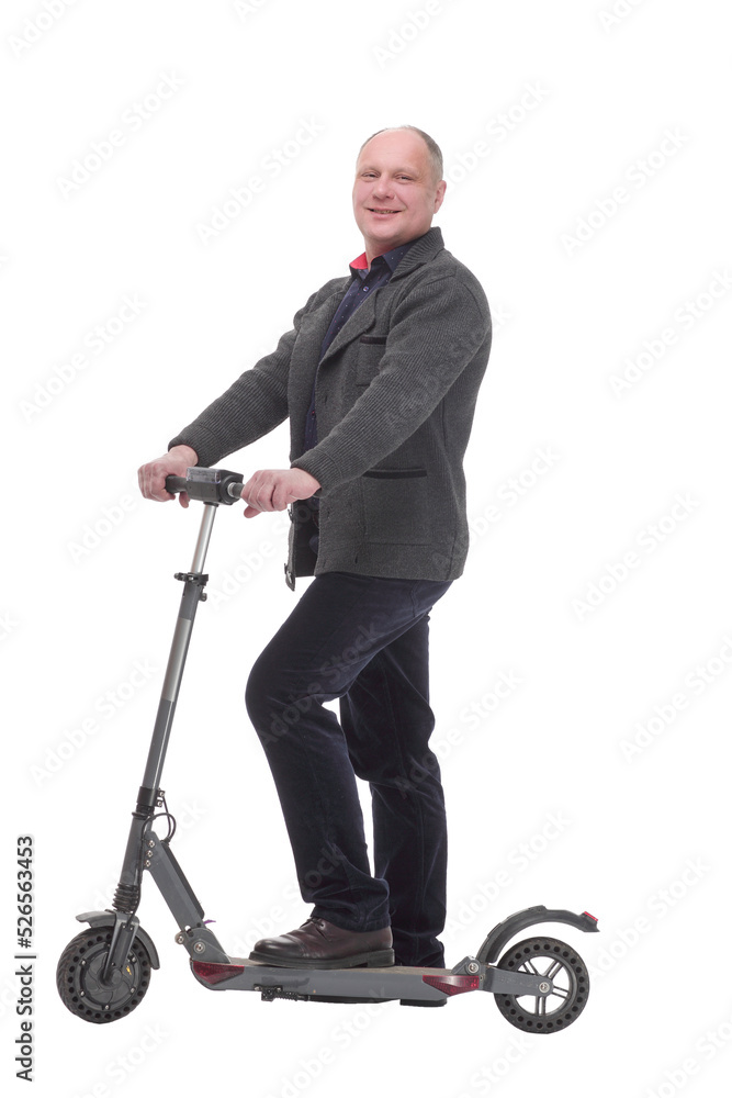 happy casual man with electric scooter .isolated on a white background. happy casual man with electric scooter .isolated on a white background.