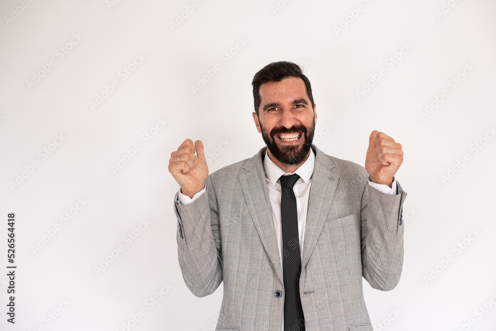 Portrait of joyful bearded man. Male in suit gesturing happily. Portrait, emotion concept Portrait of joyful bearded man. Male in suit gesturing happily. Portrait, emotion concept