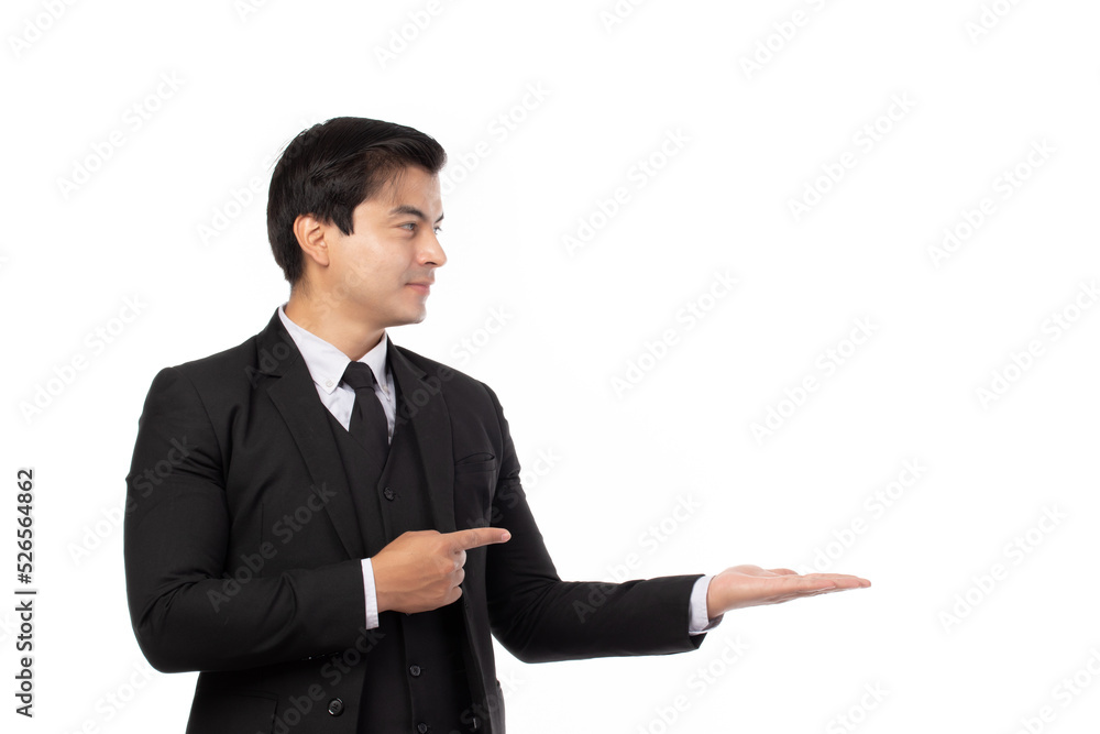 Businessman smiling, holding open palm with empty copy space. Business man showing hand sign to side concept of advertisement product isolated on white background. Businessman smiling, holding open palm with empty copy space. Business man showing hand sign to side concept of advertisement product isolated on white background.