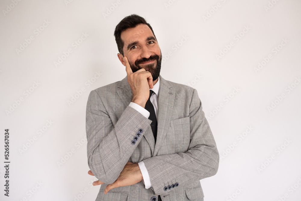 Happy bearded man got idea. Knowing face of man in suit show one finger of solving. Portrait, decision concept Happy bearded man got idea. Knowing face of man in suit show one finger of solving. Portrait, decision concept