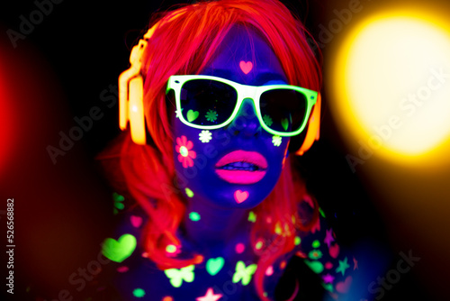 Female dancer in glow UV costume