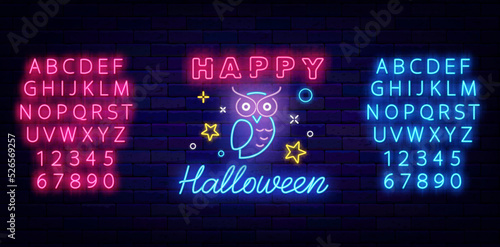 Happy Halloween neon label on brick wall. Owl icon. Shiny blue and pink alphabet. Vector stock illustration