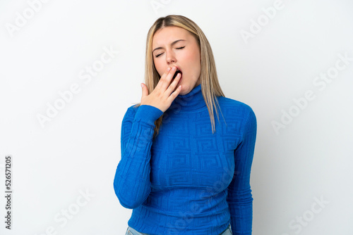 Young caucasian woman isolated on white background yawning and covering wide open mouth with hand
