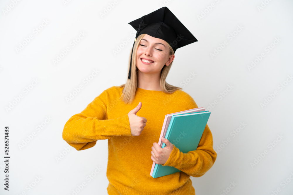 Young student caucasian woman isolated on white background giving a thumbs up gesture Young student caucasian woman isolated on white background giving a thumbs up gesture