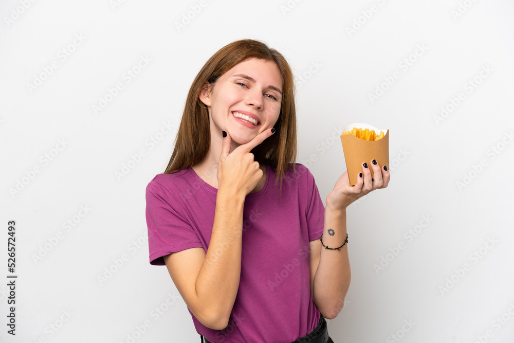 Young English woman holding fried chips isolated on white background happy and smiling Young English woman holding fried chips isolated on white background happy and smiling