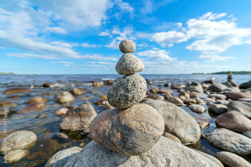 Pyramid of stones. Unstable balance of stone objects. Idyllic state of nature. Pyramid of stones. Unstable balance of stone objects. Idyllic state of nature.