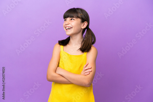 Little caucasian kid isolated on purple background happy and smiling