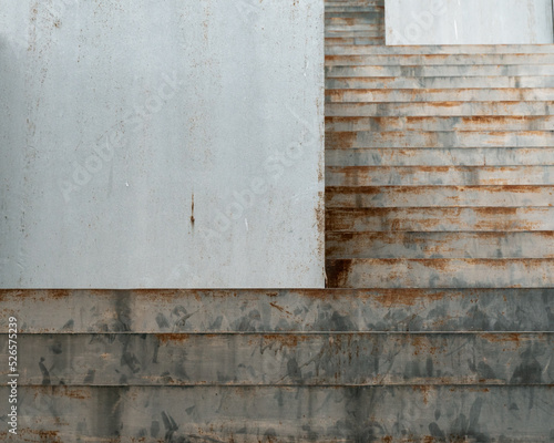 Close-up, perspective view of slightly rusted metal ladder. background concept