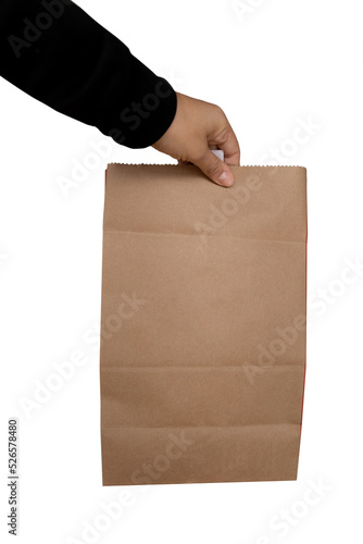 Hand picking up delivery bag. White background. © Lais