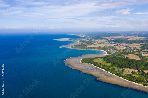 Luzon Island, Philippines. Seascape, lagoons with coral reefs, top view. Seascape with a beautiful coastline, top view. Blue ocean.