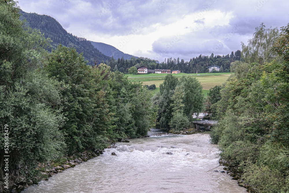 Fototapeta premium View of Enns river flowing through the town of Schladming, Styria, Austria