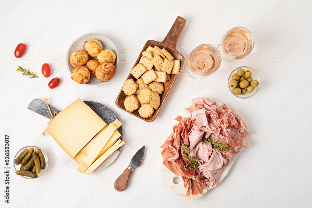Appetizers table with different antipasti, charcuterie, snacks, cheese