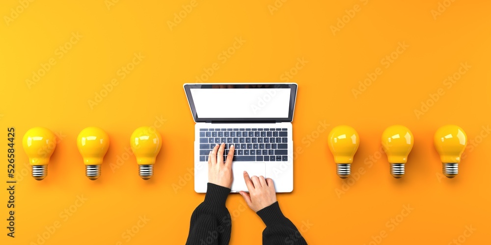 Person using a laptop computer with light bulbs from above - obrazy, fototapety, plakaty 