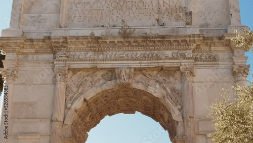 The majestic triumphal arch of the Emperor Titus located at the Roman Forum Rome photo