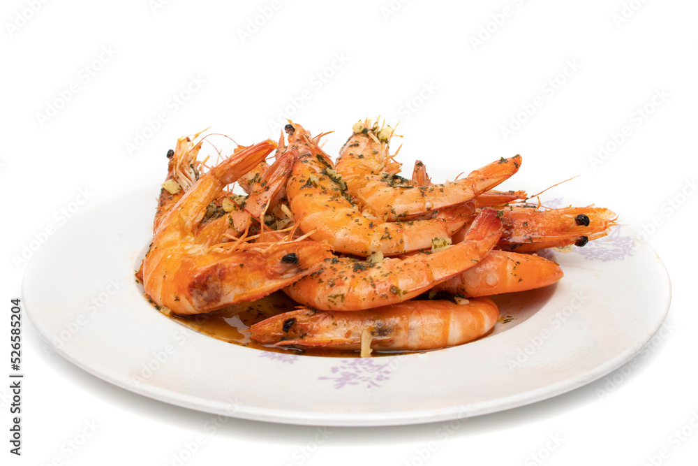 Grilled prawns, with garlic and parsley. Isolated on white background. Spanish food concept. Grilled prawns, with garlic and parsley. Isolated on white background. Spanish food concept.