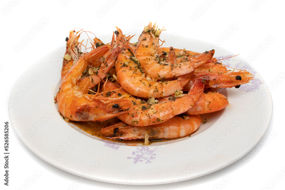 Grilled prawns, with garlic and parsley. Isolated on white background. Spanish food concept. Grilled prawns, with garlic and parsley. Isolated on white background. Spanish food concept.