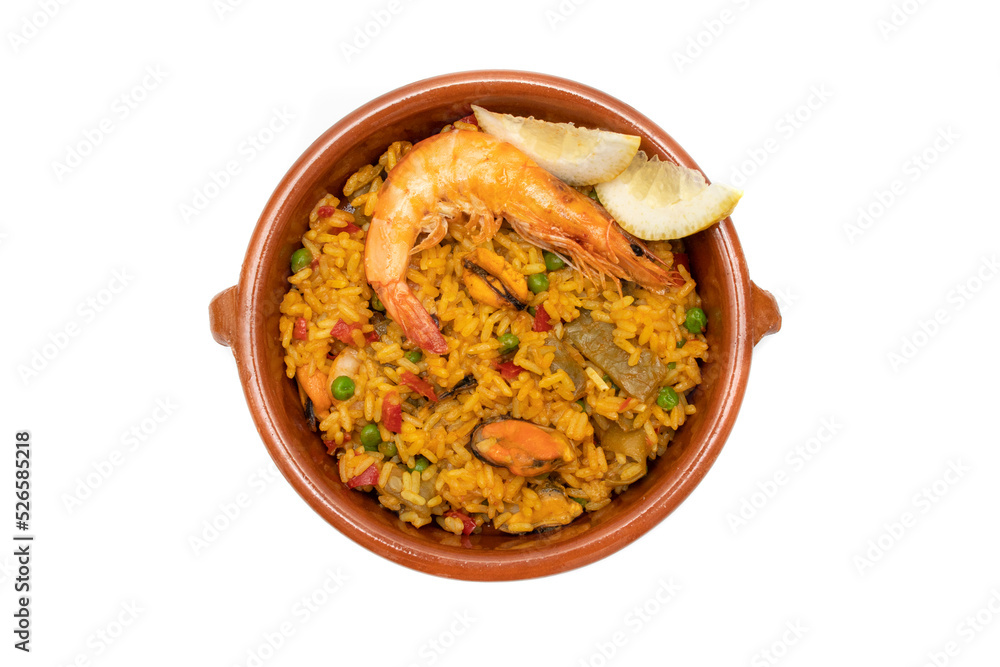 Paella, Seafood Paella in a clay pot, isolated on white background. The Spanish word paella