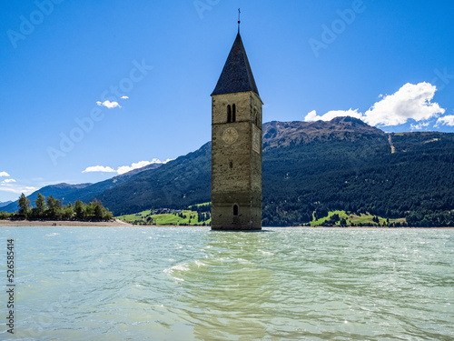 Resia pass lake and the bell tower photo