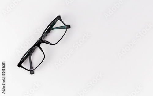 Black glasses on a white background close up, isolated