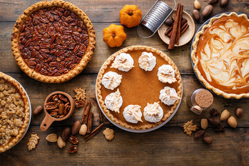 Traditional fall Thanksgiving pies, pumpkin and pecan pie