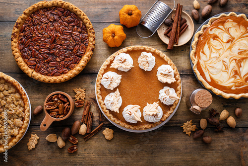 Fototapeta Naklejka Na Ścianę i Meble -  Traditional fall Thanksgiving pies, pumpkin and pecan pie