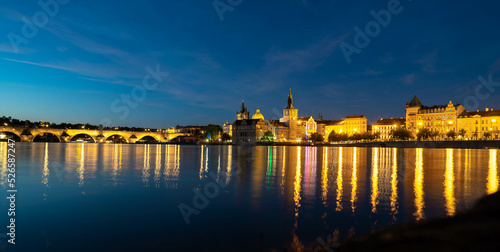 View to Charles Bridge and Vltava river in Prague Czech Republic. Sunset time.
