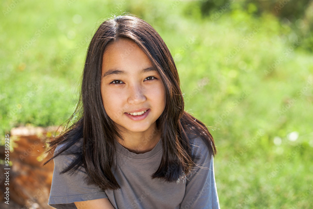 Portrait of a young beautiful girl in summer park Portrait of a young beautiful girl in summer park