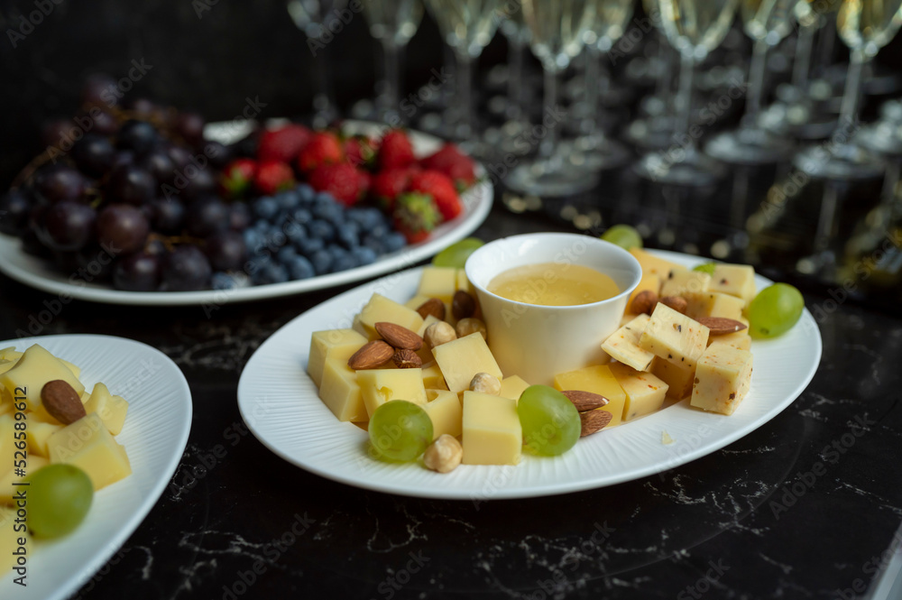 cheese plate with honey and nuts cheese plate with honey and nuts
