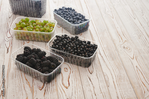 berries in plastic containers, food for customers