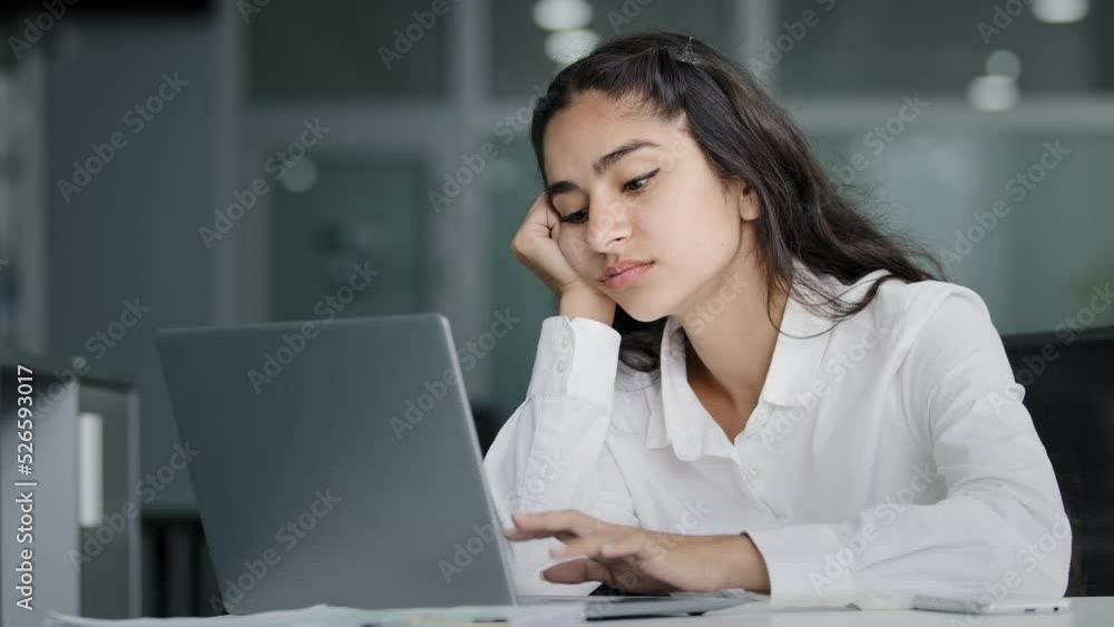 Bored sad lazy young indian woman manager sitting in office unmotivated uninterested in boring laptop work overworked tired sleepy businesswoman feeling tiredness experiencing lassitude exhausted work Bored sad lazy young indian woman manager sitting in office unmotivated uninterested in boring laptop work overworked tired sleepy businesswoman feeling tiredness experiencing lassitude exhausted work