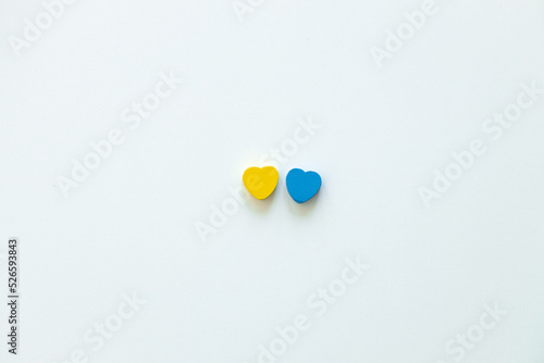 Two hearts of color Ukraine flag on white background